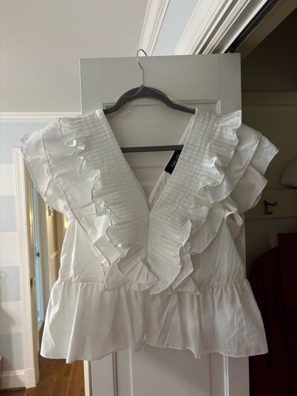 fab'rik White Pleated V-Neck Peplum Top